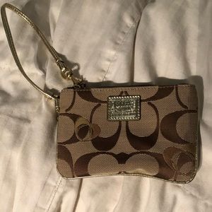 Gold accent coach wristlet